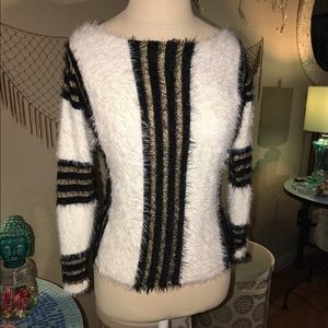 Black white and gold striped sweater